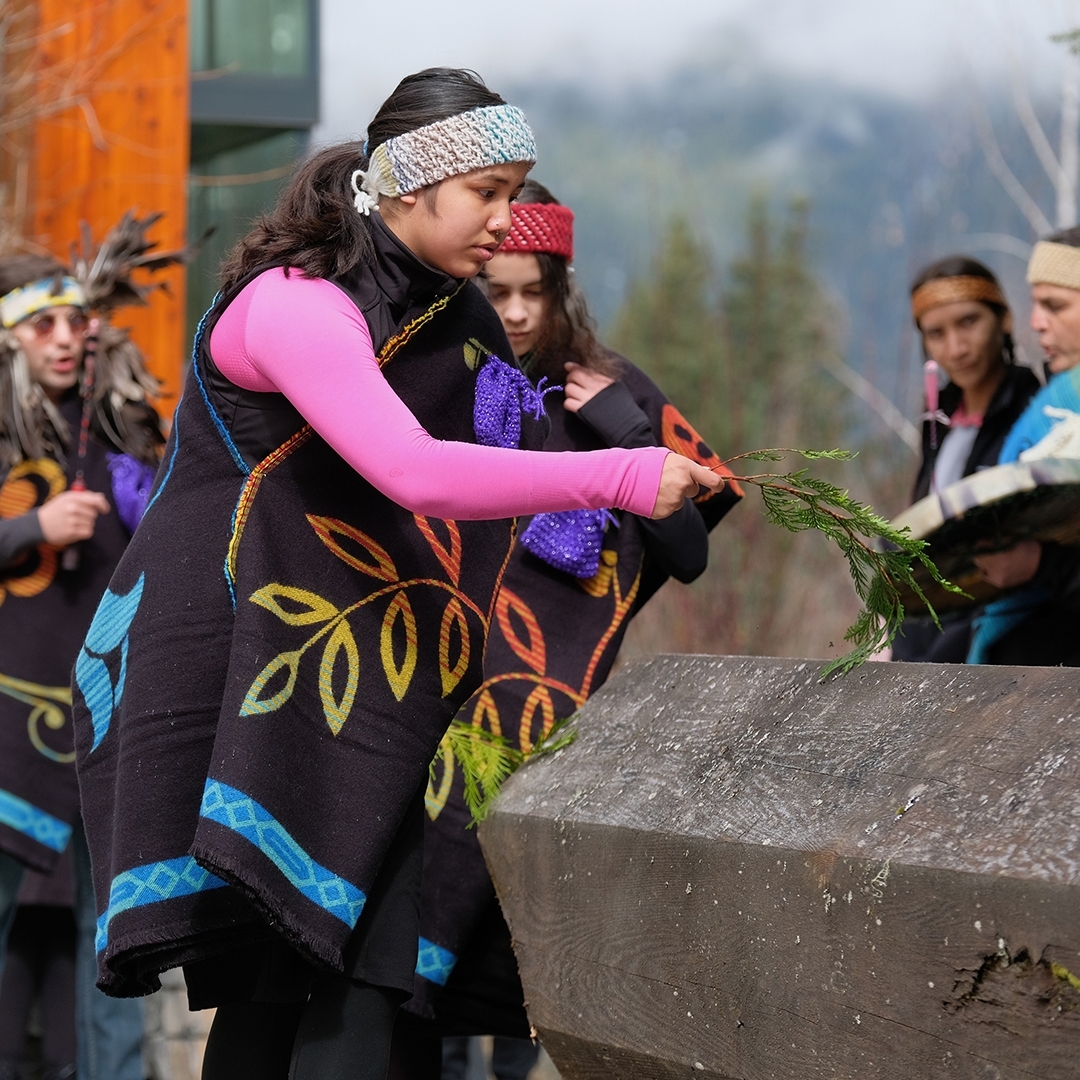 Squamish Canoe Family of the Squamish Nation blessing the log for the Community Reconciliation Canoe